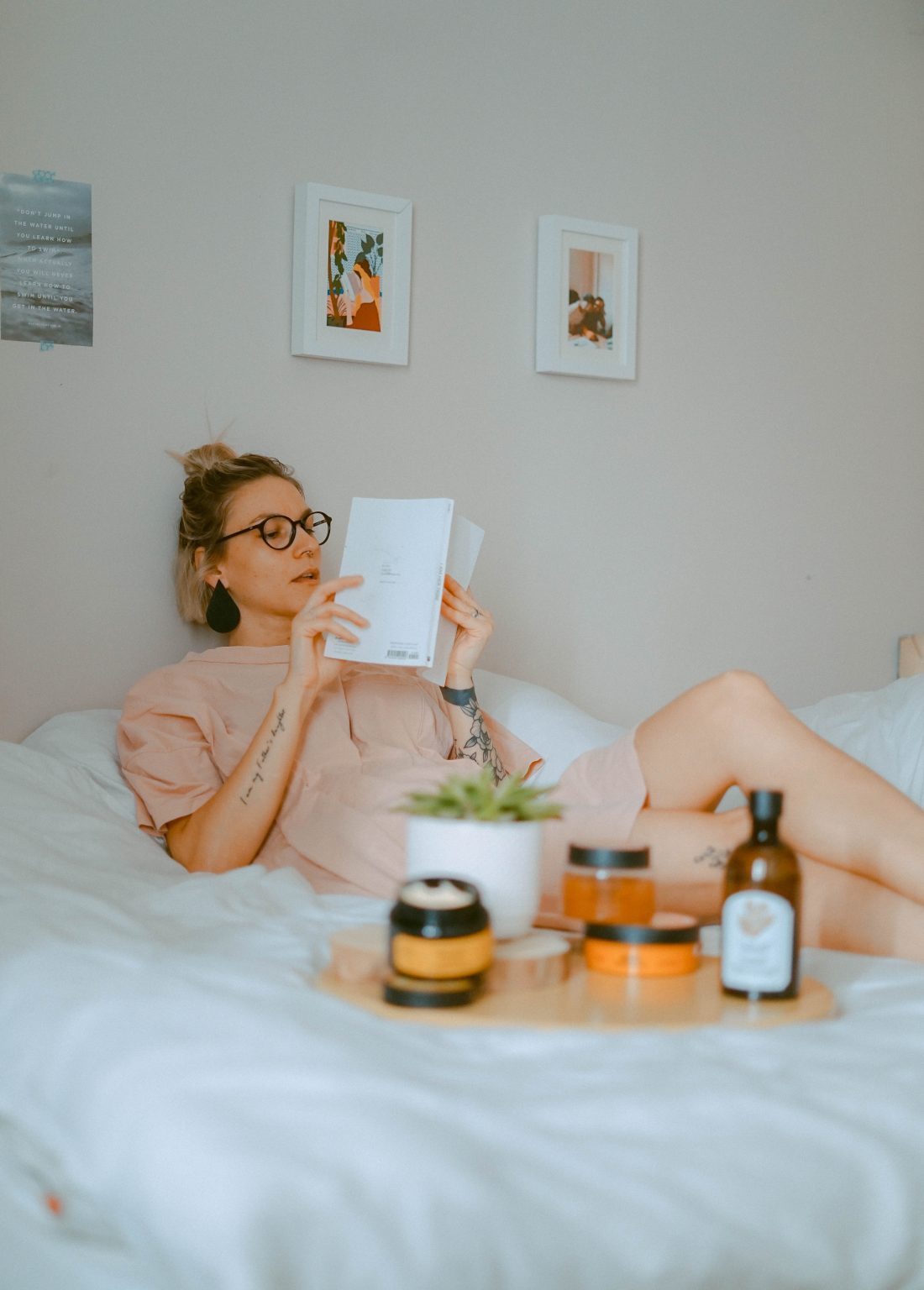 Twelve Months of Sunshine_Woman Reclining in Bed with Self Care_Image